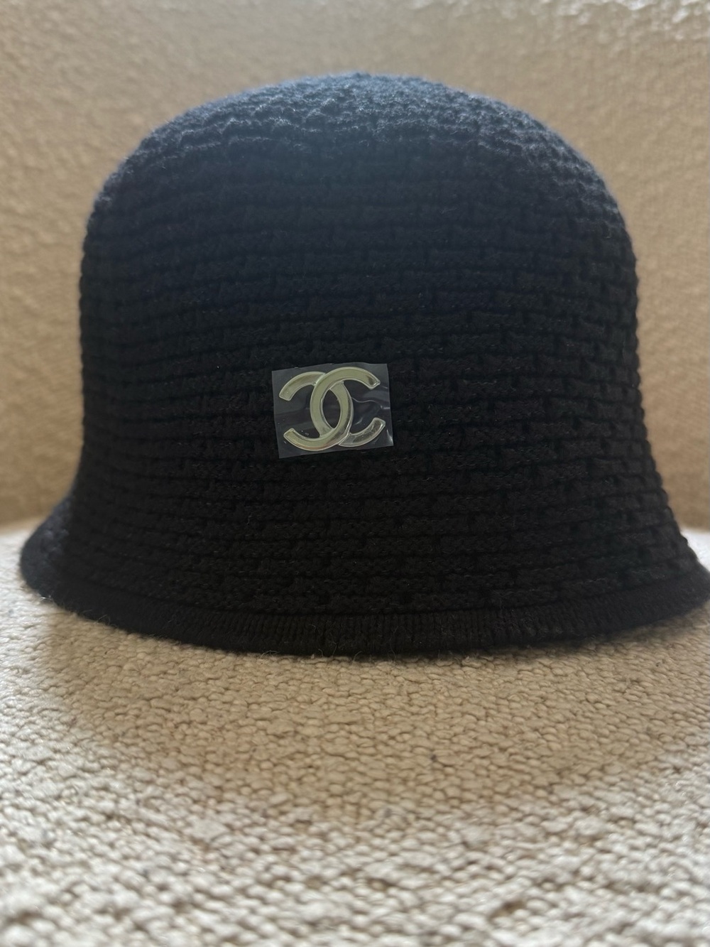 CHANEL Black Knit Bucket Hat with Silver CC Emblem